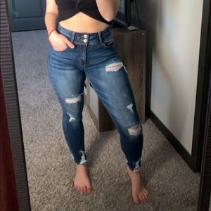 Ripped medium wash skinny jeans